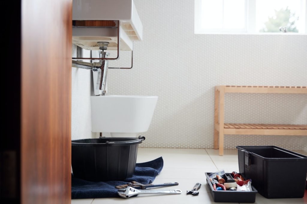 Plumbing Tools In Bathroom Ready To Repair Leaking Sink